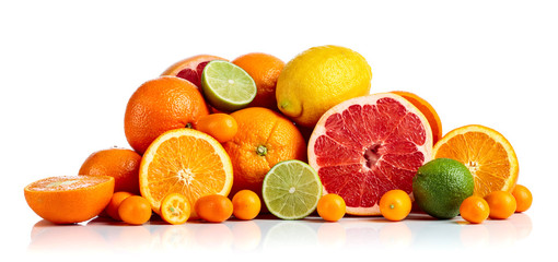 Isolated citrus fruits on white background.