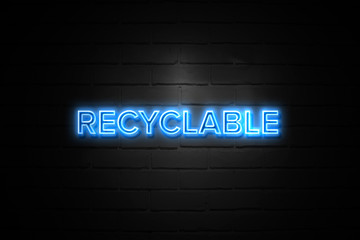 Recyclable neon Sign on brickwall