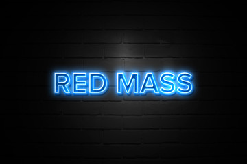 Red Mass neon Sign on brickwall