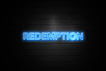 Redemption neon Sign on brickwall