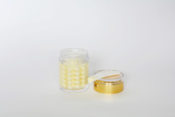 Luxurious facial white pearl cream container isolated on white