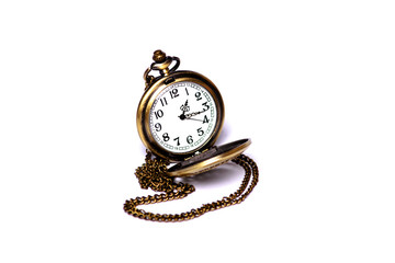 Pocket watch in yellow case on a white background