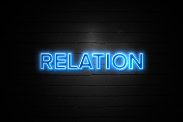 Obraz premium Relation neon Sign on brickwall