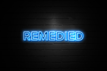 Fototapeta premium Remedied neon Sign on brickwall