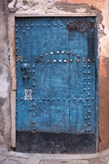 Vintage blue wooden door in Marrakesh, Morocco