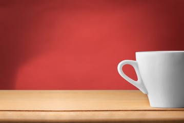 Coffee cup on background