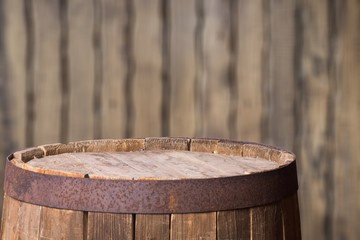 Old wooden barrel on wooden background