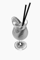 Orange juice glass with oranges with slice and cocktail straw. Isolated on white,black and white photo
