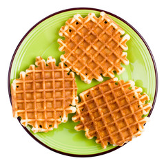 Сrunchy wafers on a plate isolated