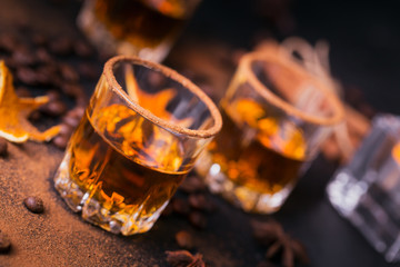 Whiskey, brandy or liquor, spices, anise stars, coffee beans, cinnamon sticks