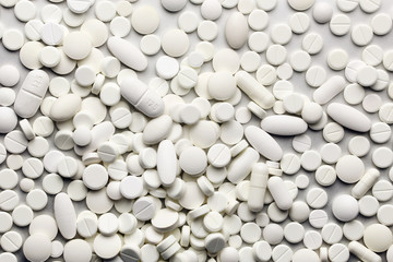 A lot of white medicine pills
