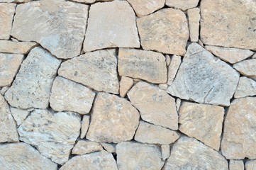 gray and ocher stone wall, background, texture