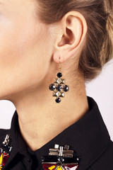 Women's ear in jewelry earrings close up