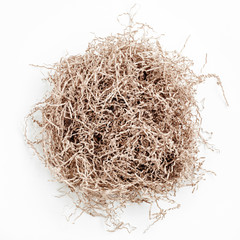 Raffia for gift packaging on white background. Neutral color.