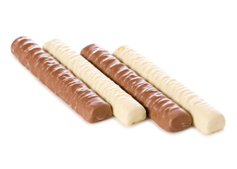 Chocolate bar stick white milk chocolate in hand