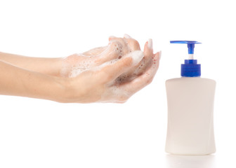 Female hand using liquid soap