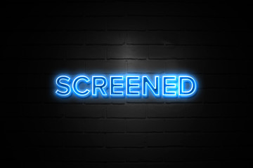 Obraz premium Screened neon Sign on brickwall