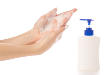 Female hand using liquid soap
