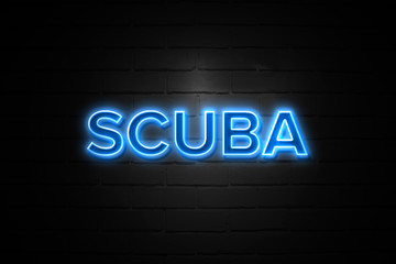 Scuba neon Sign on brickwall