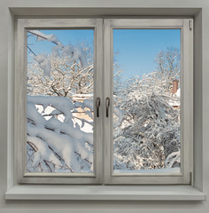 Winter landscape. View from the house through the window to the snowy yard