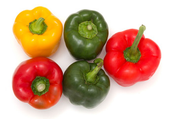 Group of bell peppers against a white background