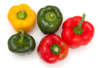 Group of bell peppers against a white background