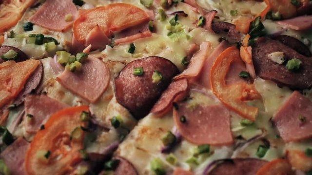 Hresh Hot Pizza and food ingredients on wooden table, macro shot, close up
