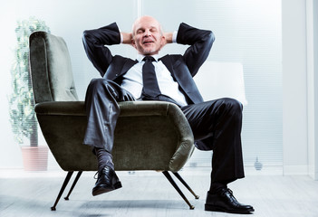 Businessman sitting relaxing and de-stressing