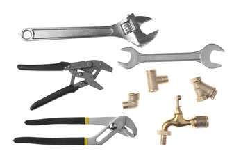 Plumber's items on white background