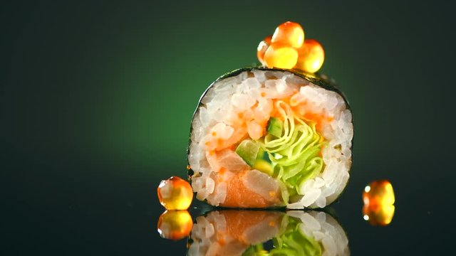 Sushi roll japanese food rotated over black background. 4K UHD video footage. 3840X2160