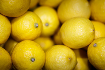 ripe yellow lemons background