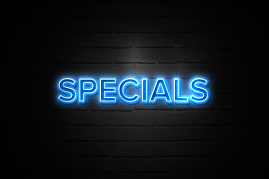 Specials neon Sign on brickwall