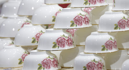 Many porcelain bowls together