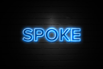 Obraz premium Spoke neon Sign on brickwall