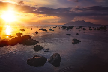 Fototapeta premium Sunset over Flores coast