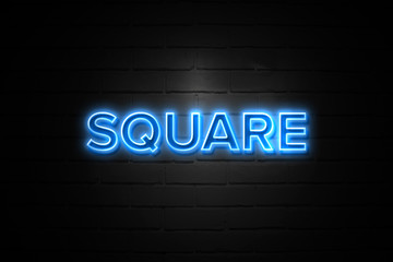 Square neon Sign on brickwall