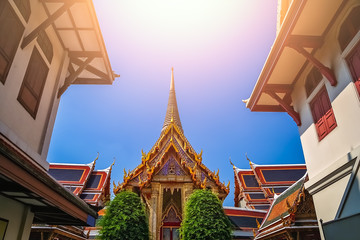 Fototapeta na wymiar Rooftops of the Buddhist temple in Bangkok