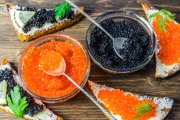 Festive sandwiches with red and black caviar. Healthy and tasty food.