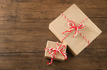 Parcel gift boxes on wooden table