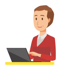 A middle-aged man wearing a sweater is operating a laptop computer