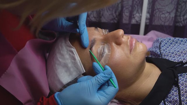 procedure in the beauty salon: lamination of eyelashes and eyebrows. Saturation of eyebrows with keratin. application of a special fixing solution. 4 k
