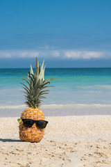 Hey girl, You a Fine-apple: Tropical pineapple chillin on a beach with sunglasses representing...