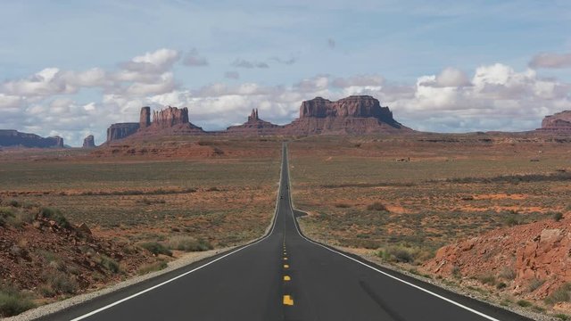 a morning shot of hwy 163, made famous in forrest gump, at monument valley in utah,usa
