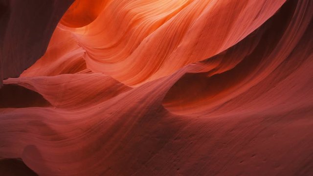 tilt up shot of a red lower antelope canyon wall in page, arizona