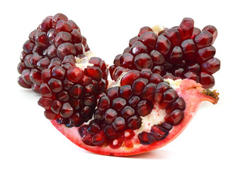 Red pomegranate fruits isolated on white background
