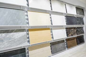 Colorful samples of a stone tile in store. Marble and granite flooring a most popular choice for...