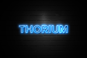 Thorium neon Sign on brickwall