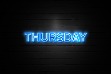 Thursday neon Sign on brickwall