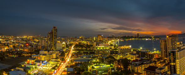 Fototapeta na wymiar Landscape at nigth time of pattaya city with colurful light in city.