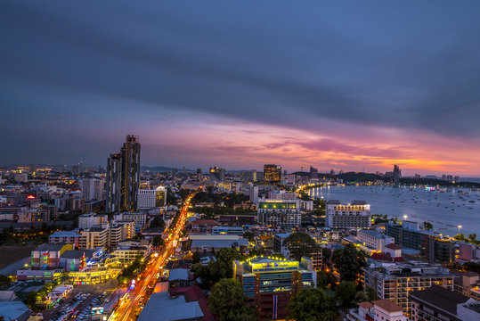 Landscape at nigth time of pattaya city with colurful light in city. © APchanel